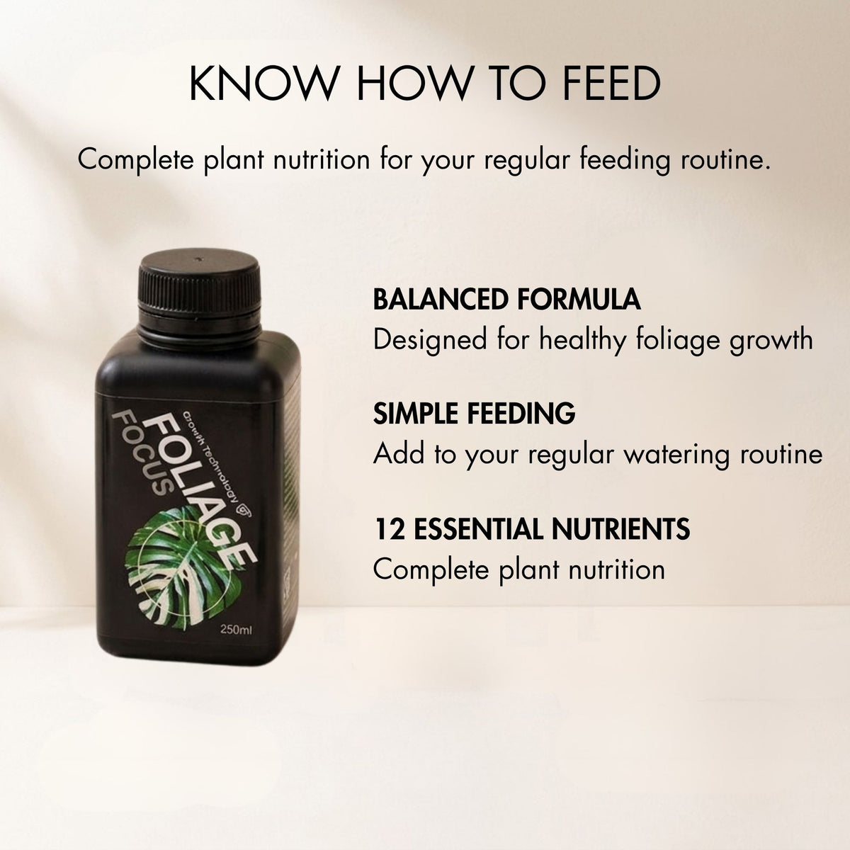 A black bottle labeled 'Foliage Focus' with a green leaf graphic, shown on a light background with promotional text about complete plant nutrition and feeding instructions.