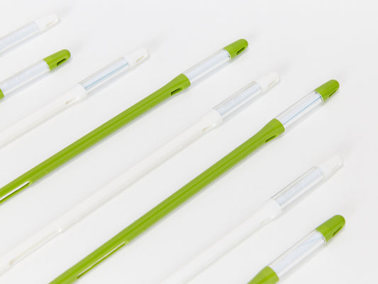 Green and white Sustee Moisture Meter