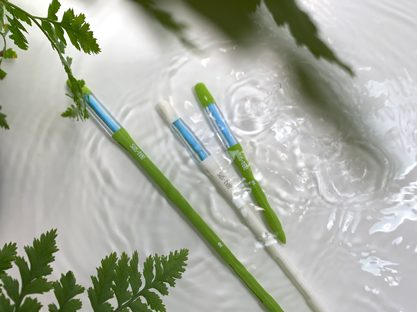 One each of a small, medium, and large Sustee Moisture meter lying down in water